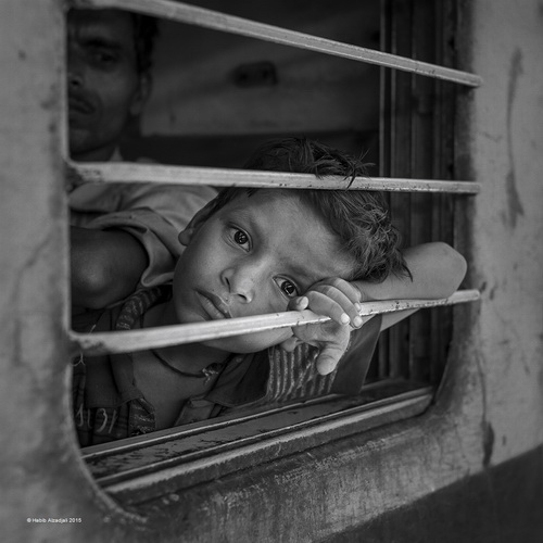 Habib Alzadjali-Boy in Train-Monochrome-UPI Gold.jpg